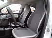 Renault Twingo - SCe 70pk Limited R&Go navig., Parkeer sens., Airco - 1 - Thumbnail