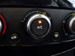 Renault Clio Estate - 1.5 dCi 90pk Limited Navig., Airco, Cruise, Lichtm. velg - 1 - Thumbnail