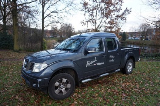 Nissan Navara - 2.5 dCi XE Double Cab Automaat 5 persoons - 1