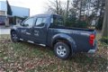 Nissan Navara - 2.5 dCi XE Double Cab Automaat 5 persoons - 1 - Thumbnail