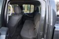 Nissan Navara - 2.5 dCi XE Double Cab Automaat 5 persoons - 1 - Thumbnail