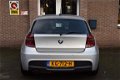 BMW 1-serie - 116I HIGH EXECUTIVE M-PAKKET/NAVI/CRUISE/CLIMA - 1 - Thumbnail