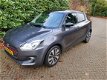 Suzuki Swift - 1.0 Stijl Smart Hybrid 112 pk Navi/Led/Climate - 1 - Thumbnail