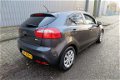 Kia Rio - 1.2 CVVT Plus Pack 5Drs /Airco//2e Eig/Led/NAP/Garantie - 1 - Thumbnail