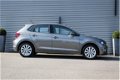 Volkswagen Polo - Comfortline 1.0 TSI 95pk Navigatie Parkeersensoren DAB Cruise control Climatronic - 1 - Thumbnail