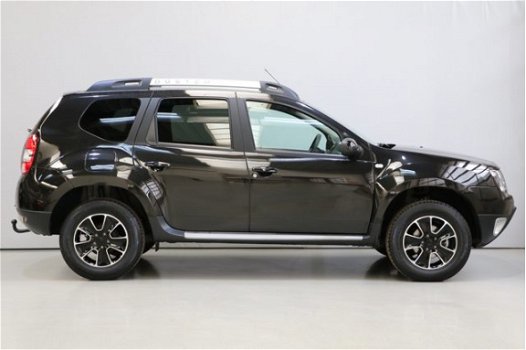 Dacia Duster - TCe 125pk 4x2 Blackshadow | Leder | Navi | Airco | Cruise | Camera | Trekhaak - 1