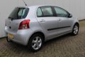 Toyota Yaris - 1.3 16V VVT-I Luna 5-DEURS AIRCO AUT - 1 - Thumbnail