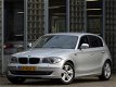 BMW 1-serie - 5D 118i ULTIMATE LEER NAVI XENON - 1 - Thumbnail