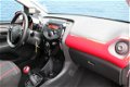Peugeot 108 - 5drs 1.0 E-VTI 68pk ENVY | Airconditioning | Bluetooth | Lichtmetaal | - 1 - Thumbnail