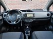 Toyota Yaris - 1e Eigenaar/Navi/Camera/Carkit/LM-velgen - 1 - Thumbnail