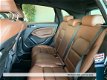 Mercedes-Benz B-klasse - B180 BLUE EFFICIENCY AUT * NAVI * TREKHAAK * PARKEERSENSOREN - 1 - Thumbnail