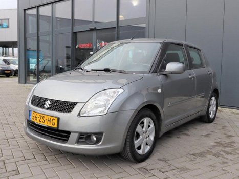 Suzuki Swift - 1.5 5D AUT Exclusive | Automaat | Airco | Keyless entry | Android Tablet - 1