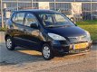 Hyundai i10 - 1.1 Active Cool AIRCO/ELEK.R/DEALER ONDERHOUDEN - 1 - Thumbnail