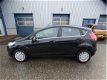 Ford Fiesta - 1.6 TDCi ECOnetic Lease Titanium / cruise control / climate control - 1 - Thumbnail