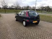 Opel Corsa - 1.0-12V Comfort AIRCO / NAP - 1 - Thumbnail