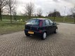 Opel Corsa - 1.0-12V Comfort AIRCO / NAP - 1 - Thumbnail