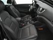 Hyundai Tucson - 1.6 T-GDi PREMIUM *177PK TURBO* / NAVI / CAMERA / LEDER / AIRCO-ECC / CRUISE CTR. / - 1 - Thumbnail