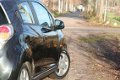 Chevrolet Spark - 1.2 16V LT 2010 Zwart, NL auto, NAP clima + PDC - 1 - Thumbnail