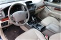 Toyota Land Cruiser 120 - 3.0 D-4D 172 pk Navigatie, Leder, Climate control - 1 - Thumbnail