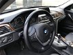 BMW 3-serie - 320i Executive Automaat Navi - 1 - Thumbnail