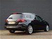 Opel Astra Sports Tourer - 1.4 Turbo Cosmo NAVI CRUISE STOELVERWARMING ACHTERUITRIJCAMERA - 1 - Thumbnail