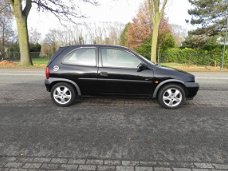 Opel Corsa - 1.2i-16V Sport