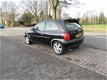 Opel Corsa - 1.2i-16V Sport - 1 - Thumbnail