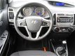 Hyundai i20 - 1.2i i-Motion, 5-Deurs / Airconditioning / Sportvelgen / Rijklaar incl. Bovag garantie - 1 - Thumbnail