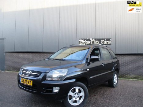 Kia Sportage - 2.0 CVVT X-ecutive - 1