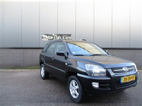 Kia Sportage - 2.0 CVVT X-ecutive - 1