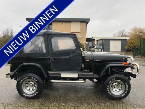 Jeep Wrangler - 2.5i Hardtop Laredo - 1