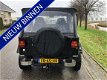 Jeep Wrangler - 2.5i Hardtop Laredo - 1 - Thumbnail