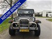 Jeep Wrangler - 2.5i Hardtop Laredo - 1 - Thumbnail