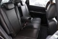 Hyundai Tucson - 2.0 CRDi 4WD Style - Met nieuwe APK - 1 - Thumbnail