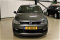 Volkswagen Polo - 1.2 TSI 90pk R-Line Automaat - ECC 100% (Dealer) onderhouden label - 1 - Thumbnail