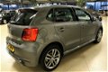 Volkswagen Polo - 1.2 TSI 90pk R-Line Automaat - ECC 100% (Dealer) onderhouden label - 1 - Thumbnail