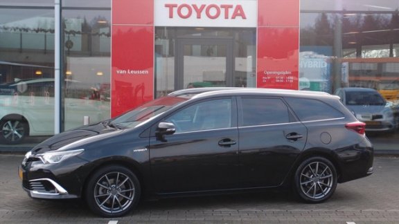 Toyota Auris - 1.8 HYBRID LEASE PRO 1E EIG NL-AUTO LED - 1