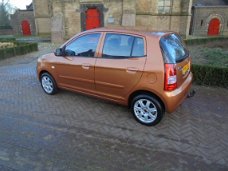 Kia Picanto - 1.1 Automaat EX Airco bij Vakgarage®