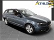 Skoda Octavia Combi - 1.6 TDI Greenline Businessline Navigatie, Xenon, Leer, Ecc, Lv, Pdc - 1 - Thumbnail