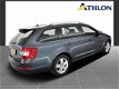 Skoda Octavia Combi - 1.6 TDI Greenline Businessline Navigatie, Xenon, Leer, Ecc, Lv, Pdc - 1 - Thumbnail