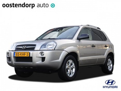 Hyundai Tucson - 2.0i Dynamic Executive | Airco | Parkeersensoren | Cruise control | Radio/CD - 1