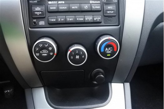 Hyundai Tucson - 2.0i Dynamic Executive | Airco | Parkeersensoren | Cruise control | Radio/CD - 1