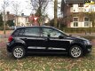 Volkswagen Polo - 1.2-12V BlueMotion Comfortline style uitvoering airco stoelverwaring velgen2011 - 1 - Thumbnail