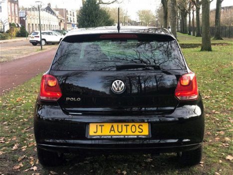 Volkswagen Polo - 1.2-12V BlueMotion Comfortline style uitvoering airco stoelverwaring velgen2011 - 1