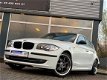 BMW 1-serie - 116i *LUXE*NAVI/BLUETOOTH*CLIMA*NWEAPK*INRUILMOG - 1 - Thumbnail