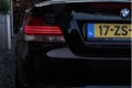 BMW 1-serie Cabrio - 118i 143pk High Ex / Leder / Navi / Xenon / Goed onderhouden - 1 - Thumbnail