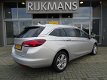 Opel Astra Sports Tourer - Online Edition 1.4T 150 pk - Navi - AGR - climate - cruise - trekhaak - l - 1 - Thumbnail