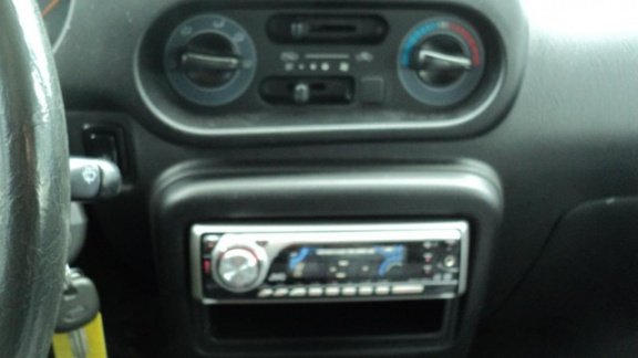 Daihatsu Cuore - 1.0-12V XTi automaat - 1