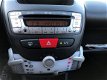 Peugeot 107 - 1.0 Active AIRCO LED ORG 60501 KM NAP O.H BOEKJES 5 DEURS LUXE UITVOERING - 1 - Thumbnail