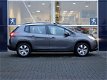 Peugeot 2008 - 1.2 PureTech 82pk Blue Lion NAVI l AIRCO l PANODAK - 1 - Thumbnail